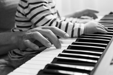 Fototapeta premium my mother teaches me to play the piano