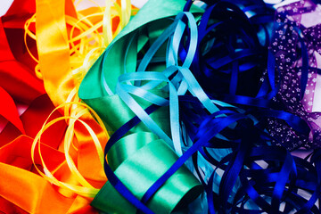 rainbow of colorful ribbons of different widths and textures