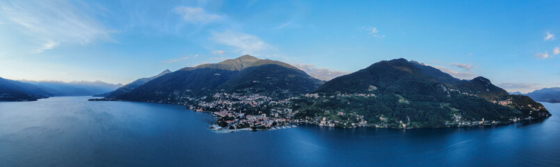 Fototapeta na wymiar aerial panorama of italian village by lake