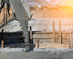 Pouring cement during sidewalk upgrade