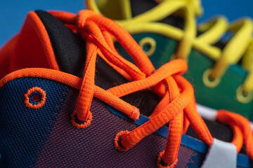 colored laces on sports sneakers close-up