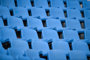 Naklejka premium Empty soccer stadium tribune. As a safety measure during corona virus pandemic, soccer matches are taking place without public