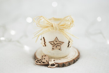 jar decorated with wooden things