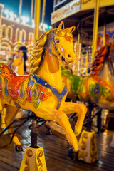 Bright horses, colorful carousel, holiday, Christmas market, selective focus