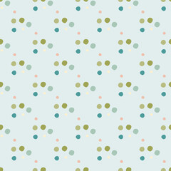 Geometric polka dot seamless pattern. Little circles in green, blue colors on pastel light background.