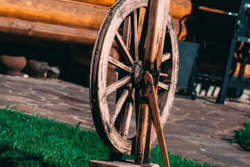 Old Russian traditional folk wooden vintage peasant spinning wheel for wool