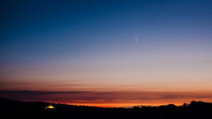 Comet Neowise above a beautiful sunrise in Spain.  