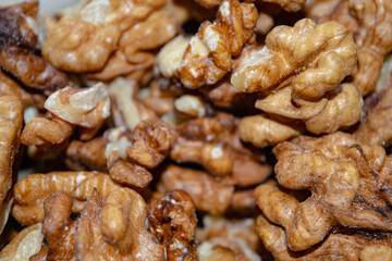 Peeled walnuts close-up. Surface texture. Healthy diet.