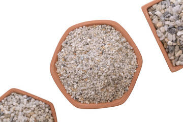 Stones to decorate in soil ware pots  isolated on white background
