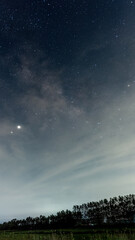night sky with milky way stars and clouds