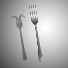 Deformed shadow of fork on gray background