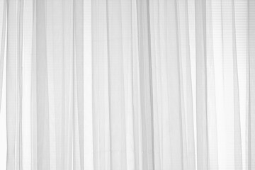 White gauze a thin translucent fabric or transparent curtain on the window sunlight filter