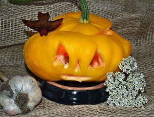 All Saints' Eve. Halloween decorations with pumpkin. Thanksgiving Day.  Postcard. 