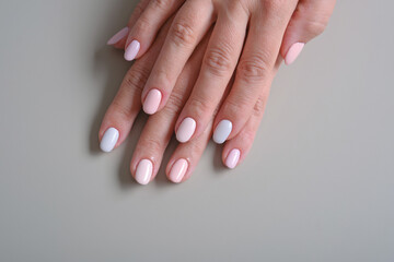 Perfect artificial fingernails of adult woman. 

