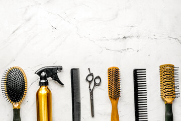 hairdressing concept with barber tools on white background top view mockup