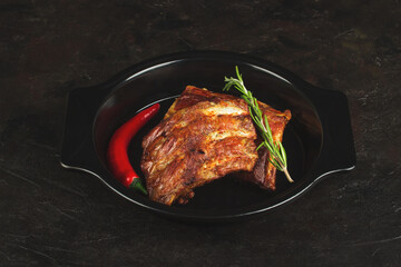Baked pork ribs with rosemary and hot pepper