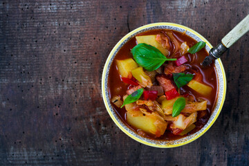 Homemade lecho with sausage, red pepper, tomatoes and zucchini. Traditional Hungarian stew.