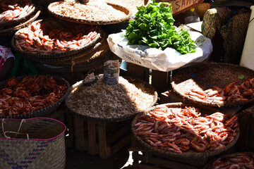 dried fish in baskets at market in nosy be madagascar