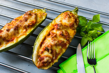 Zucchini stuffed with fresh tomatoes, tomato sauce, gouda cheese and mozzarella cheese.