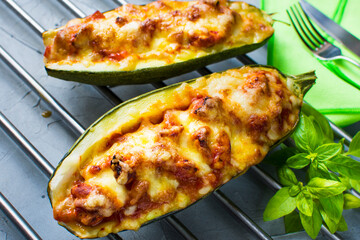 Zucchini stuffed with fresh tomatoes, tomato sauce, gouda cheese and mozzarella cheese.