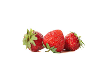 Three fresh strawberries isolated on white background