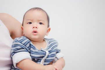 8 months baby boy  portrait, asian kid face, little boy looking at camera