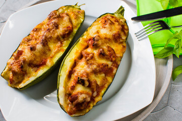 Zucchini stuffed with fresh tomatoes, tomato sauce, gouda cheese and mozzarella cheese.