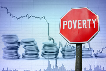 Poverty sign on economy background - graph and coins. Financial crash in world economy because of coronavirus. Global economic crisis, recession