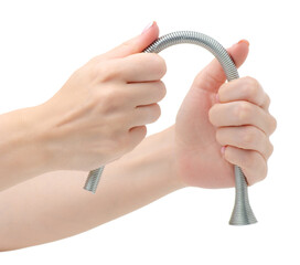 Tube bending spring in hand on white background isolation