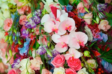 The composition is made by florists from fresh flowers.