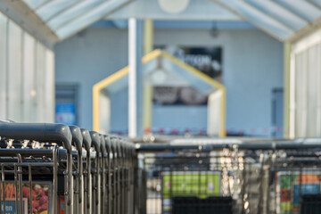 Shopping carts are in the row, depth of field. Goeppingen.