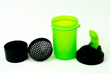 Green shaker on a white background.