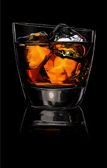 Glass of whiskey isolated on black background.