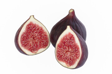Sliced fresh figs on white background