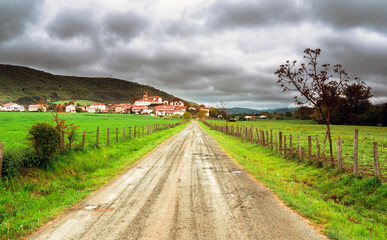 Fototapeta na wymiar Lizaso, Navarre / Spain: Dirty road towards the little village of Lizaso