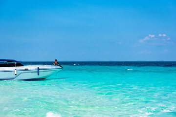 speedboat anchored offshore. Andaman Sea, Bamboo Island. Thailand