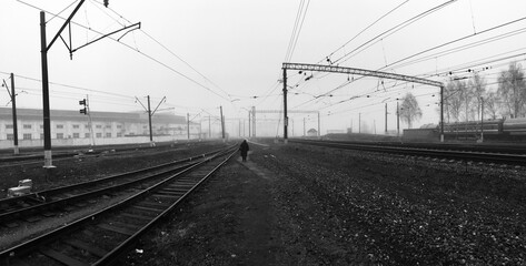 Abstract russian railway depressive cityscape with lonely old women figure