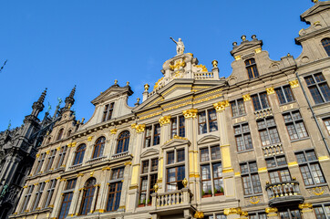 Fototapeta na wymiar Buildings on the Grand Place in Brussels. This square resisted the attacks and bombings. Some buildings were rebuilt in the 1604s.