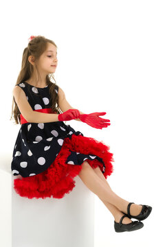 Portrait of Pretty Girl Wearing Retro Style Polka Dot Dress