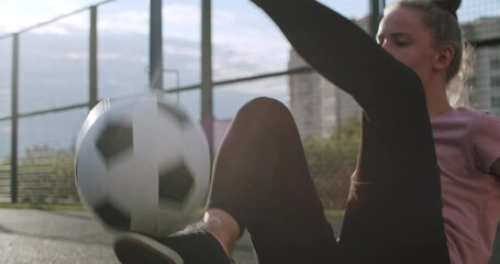 Girl practicing soccer skills and tricks