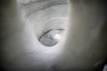 Fototapeta premium Ice wall with hole, ice cave in Iceland