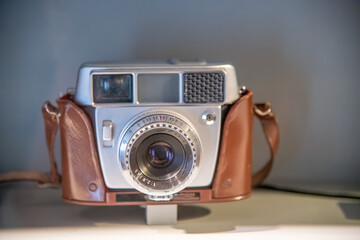 Old vintage camera with classic brown case