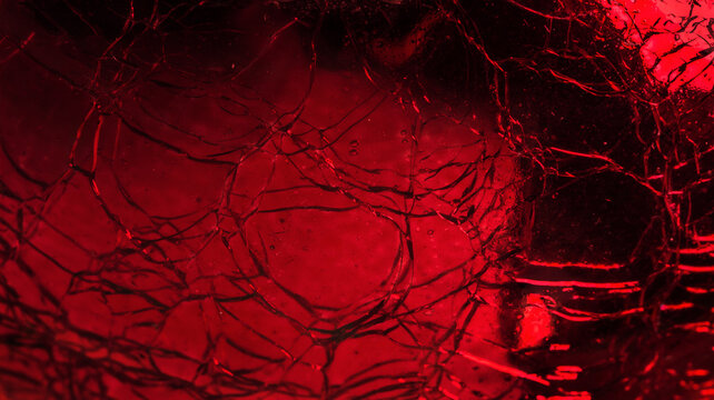 Cracked red glass texture, background