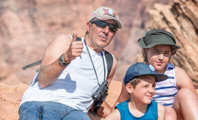 Family wearing hats visiting national park in summer season