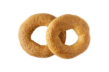 Two traditional turkish simit bagels with sesame on white