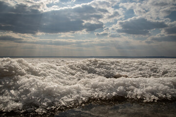 clouds and frozen river