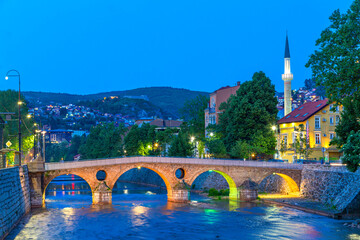 Skyline of Sarajevo at the twilight with arched Latin Bridge, Sarajevo, Bosnia and Herzegovina