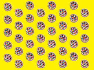 Brigadeiro, a traditional Brazilian chocolate candy. Continuous repeat pattern over colored background.