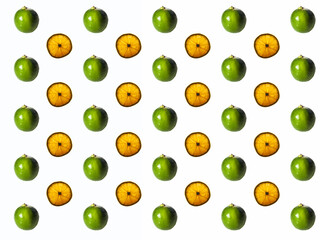 Pattern of fresh fruits slices on pastel background from top view.