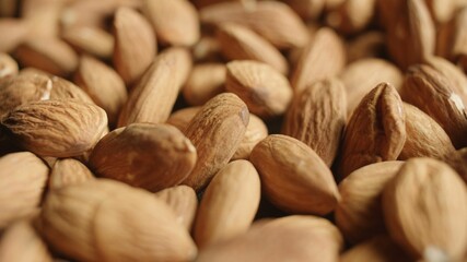 Macro slide shot of Pile of Almonds